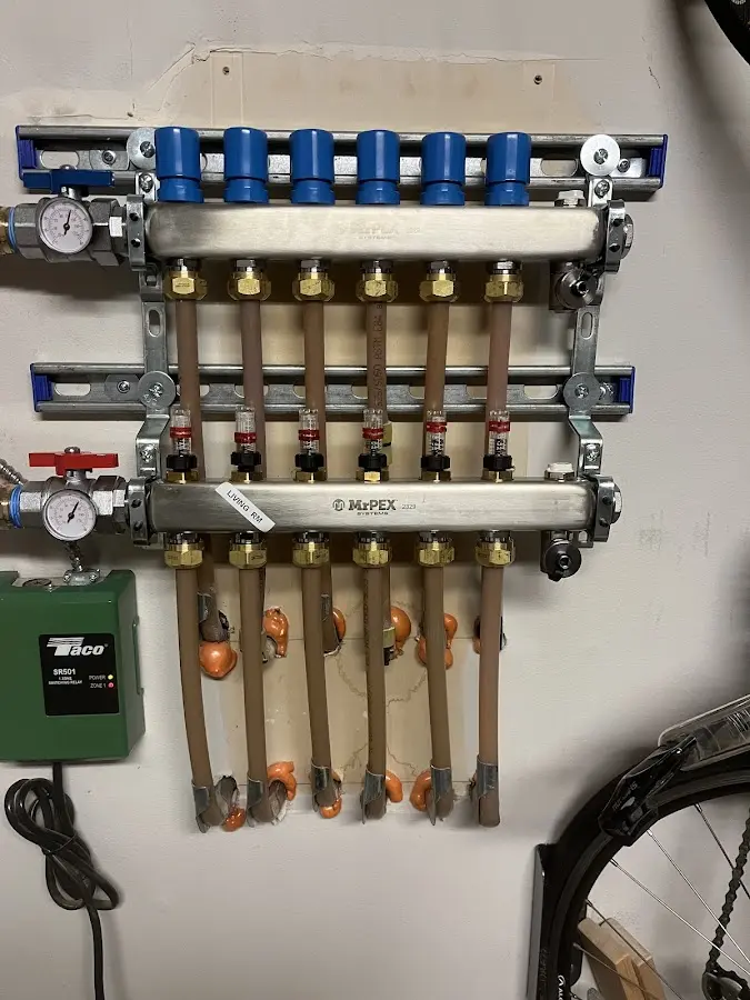 Plumber performing Leak Detection at a residential property in Forest Hills